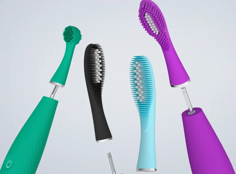 Several FOREO issa brush heads being swapped on toothbrush handles