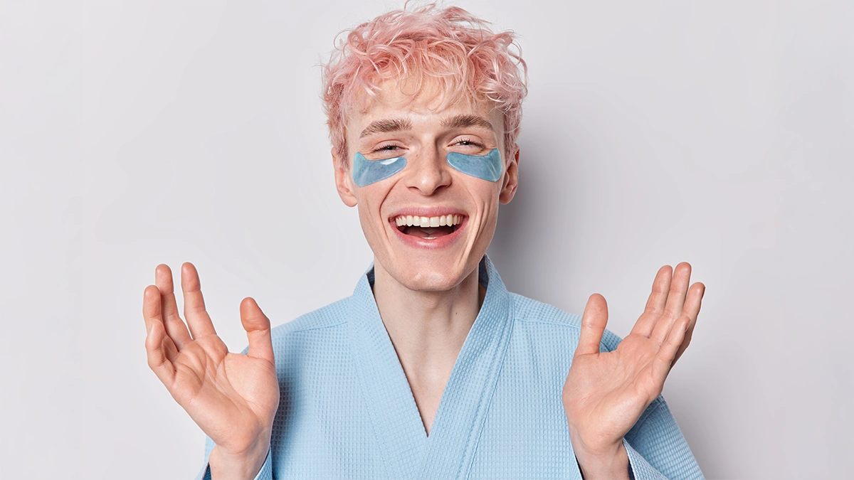 a man with under eye patches