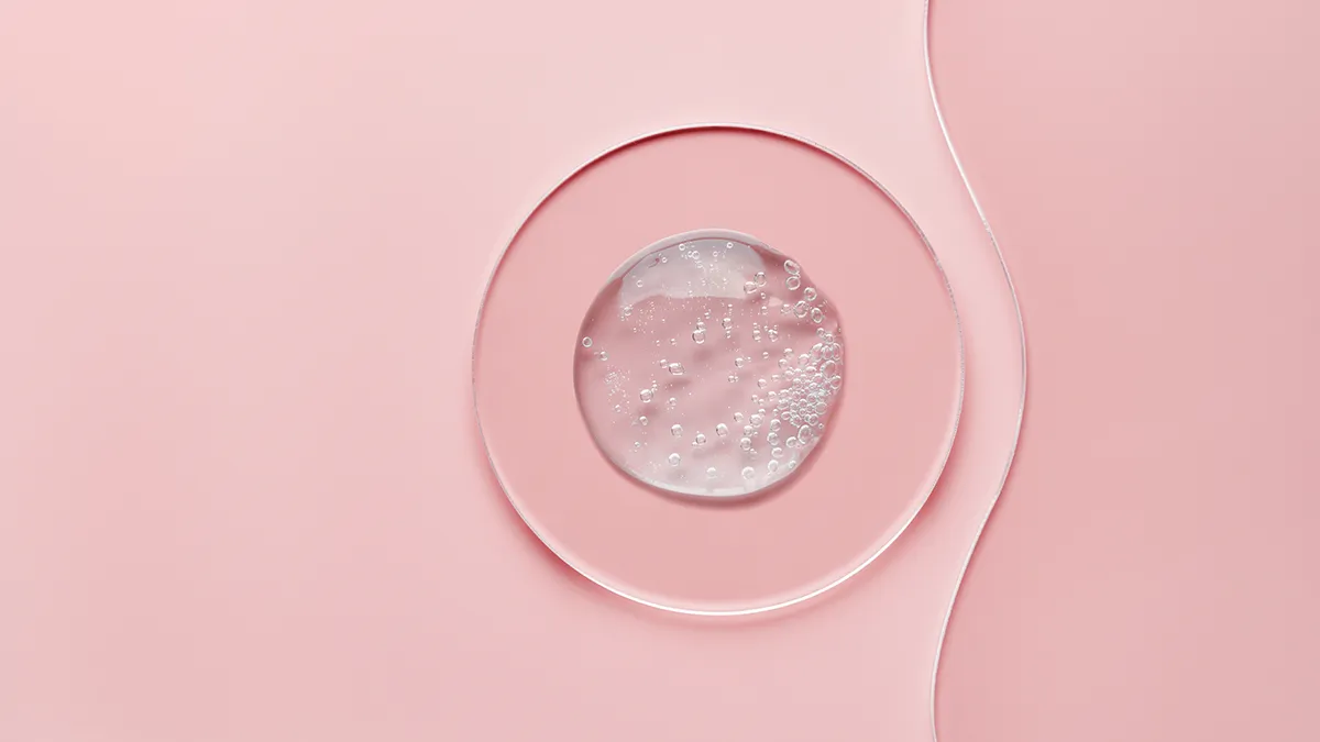 best microcurrent gel, abstract round blob on pink background