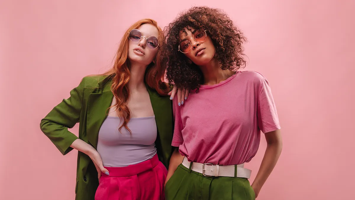 Two women with different curly hair types