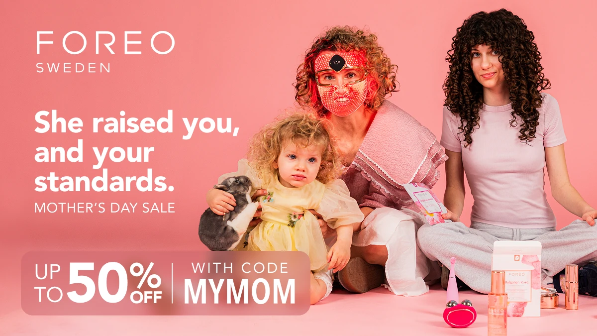 Mother's Day Deals 2026 mother using LED mask and 2 daughters, all with curly hair 