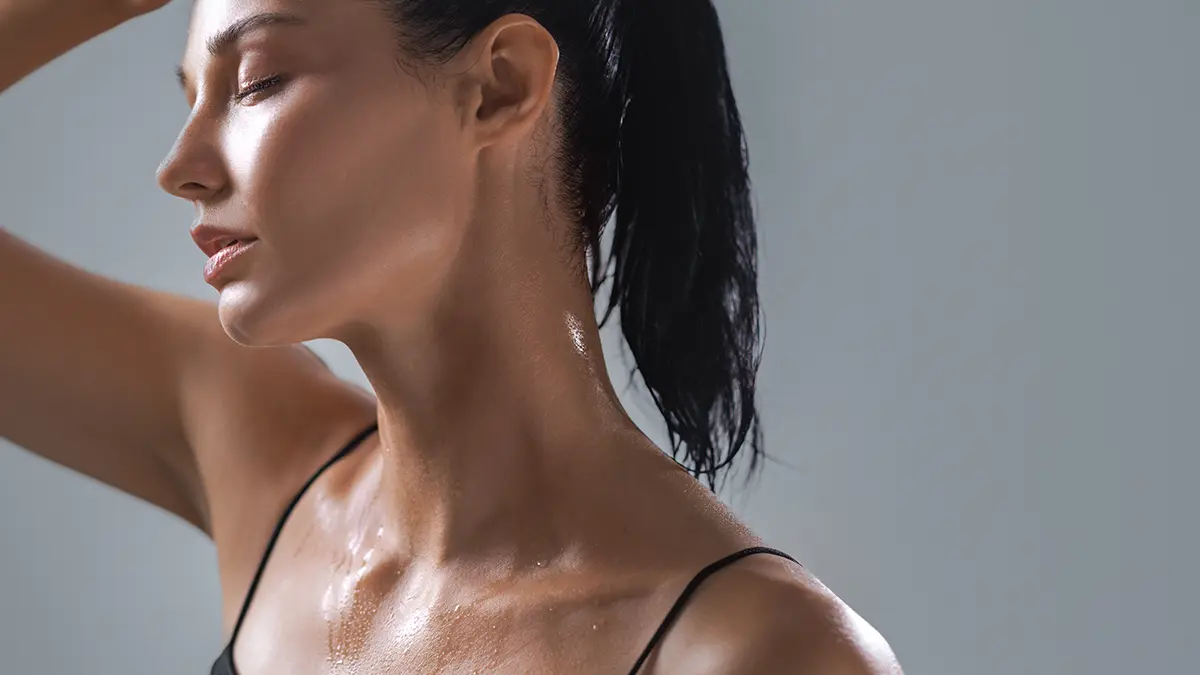 A sweaty woman with her hair up