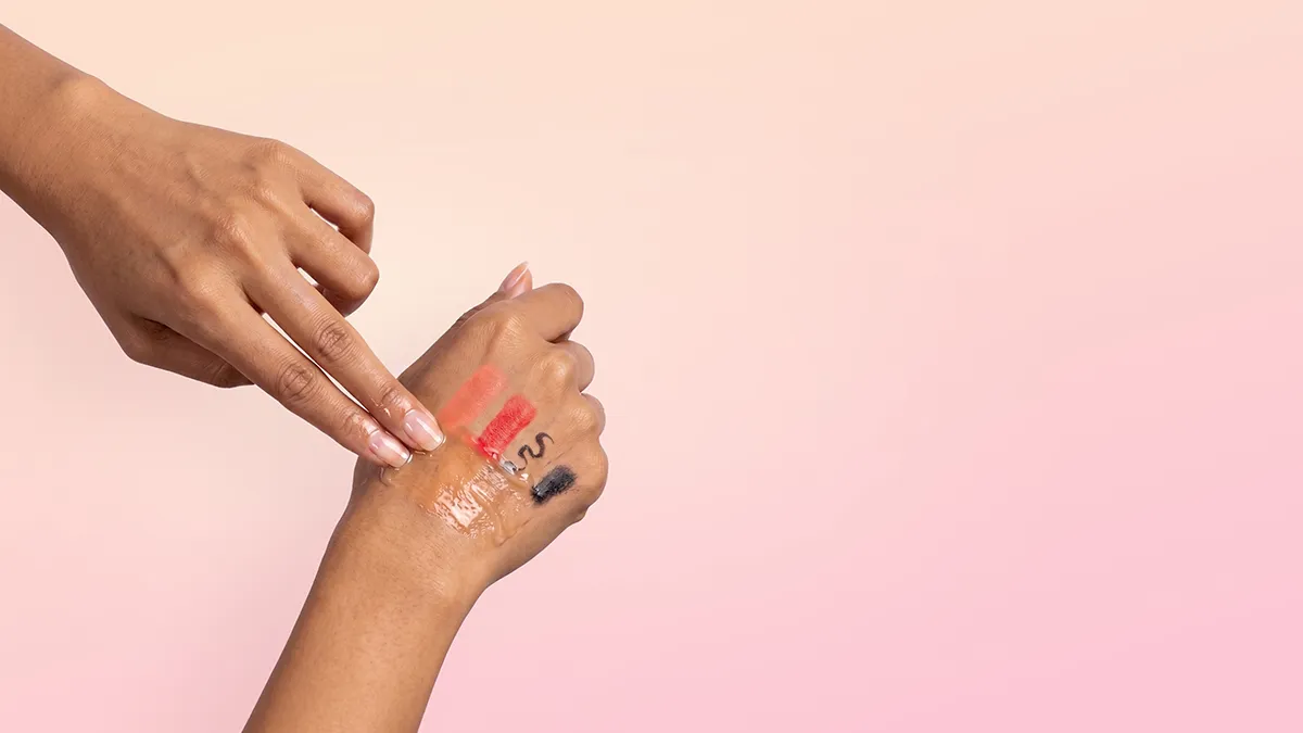 LUNA™ Buttercloud Cleansing Balm removing waterproof makeup from hand