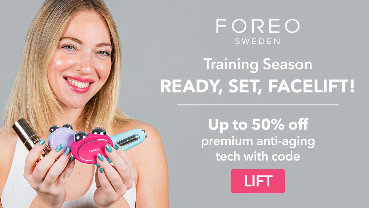 A woman holding multiple microcurrent facial toning devices