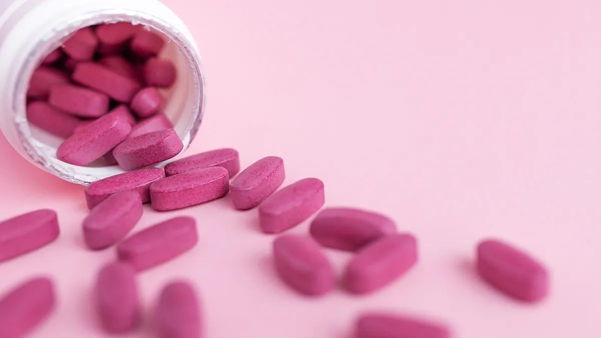Pink pills women's supplements