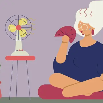 A cartoon of a menopausal woman having a hot flash and sitting in front of a fan