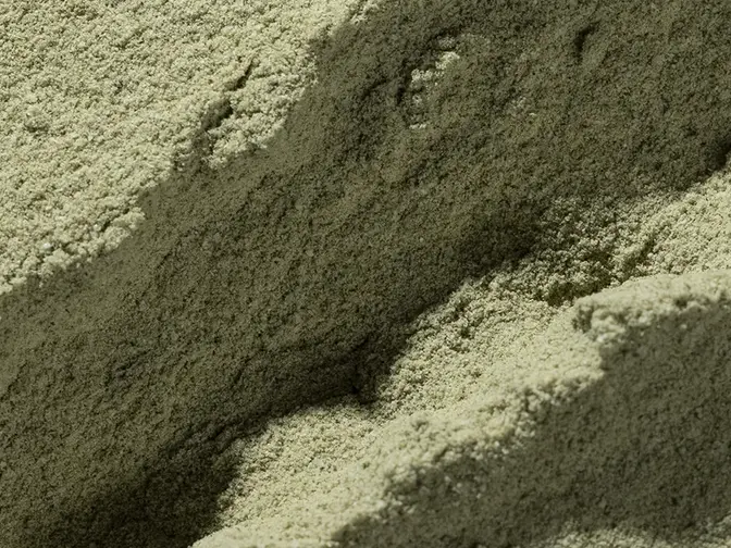 super greens powder texture with a sort of a canyon in the powder