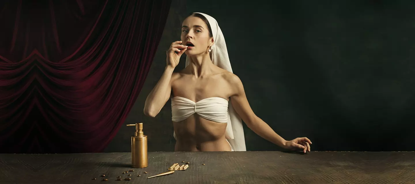 A woman taking an anti-aging supplement on a dark background, depicted as a classical artwork