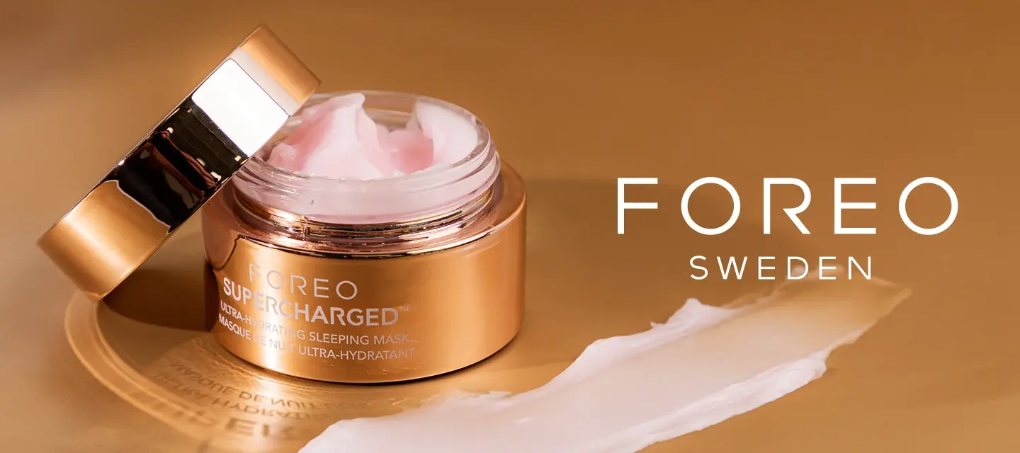 FOREO hydrating skincare in a gold jar on a caramel background