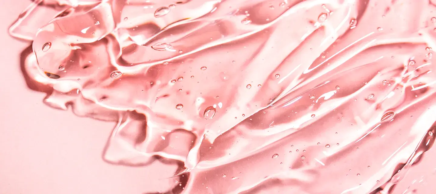 Conductive gel Conductive gel beautifully smeared on a pink backgorund