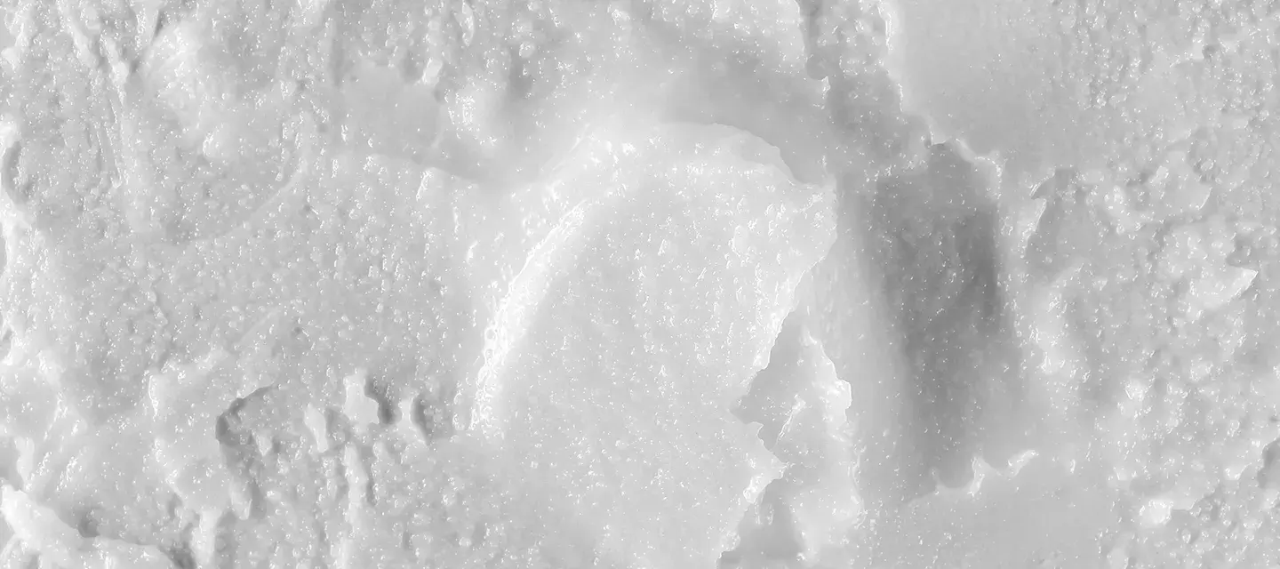The white landscape of a closeup texture of coconut oil