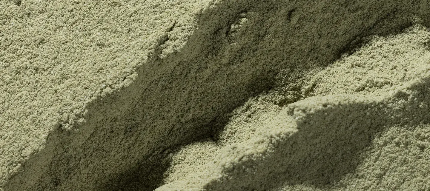 super greens powder texture with a sort of a canyon in the powder