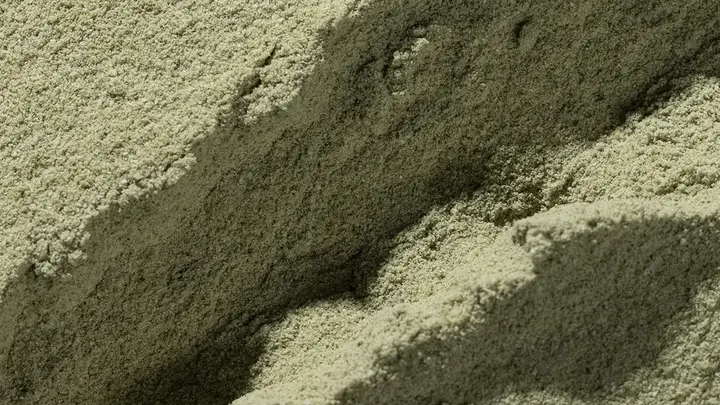 super greens powder texture with a sort of a canyon in the powder