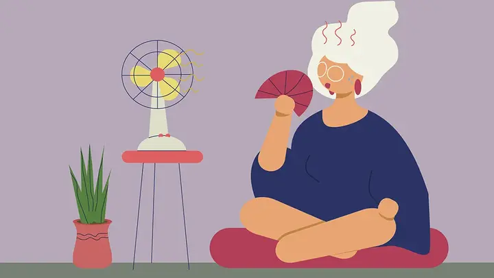 A cartoon of a menopausal woman having a hot flash and sitting in front of a fan