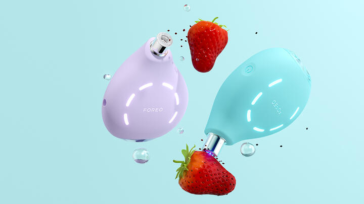 A photo of FOREO KIWI and FOREO KIWI derma sucking the seeds from the strawberries